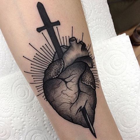 Sword stabbed heart tattoo