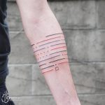 Thin colorful lines tattoo