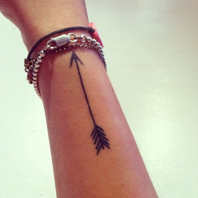 Thin small black arrow tattoo - Tattoogrid.net