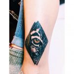 Tigers eye in a rhombus shape tattoo