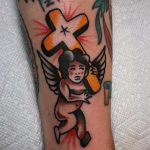 Traditional angel with a cross tattoo