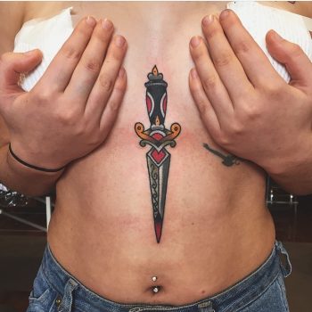Traditional dagger tattoo on the sternum