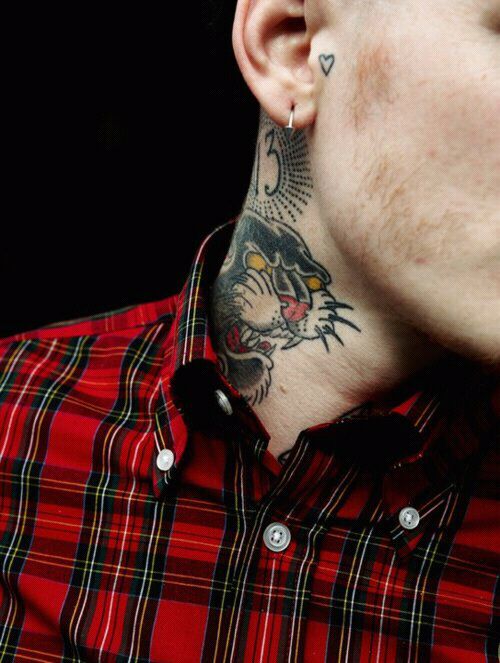 Traditional panther tattoo on the neck