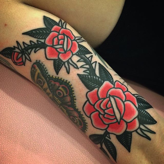 traditional red rose tattoo