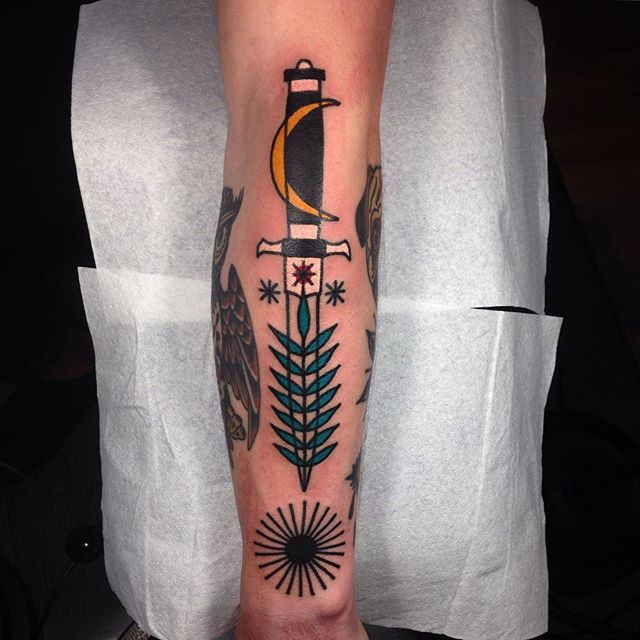 Traditional style dagger tattoo