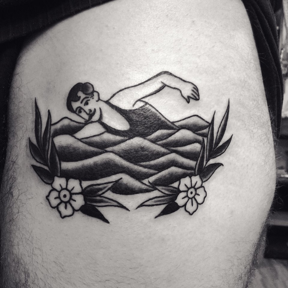 Traditional style swimmer tattoo