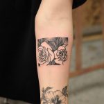 Two roses tattoo in the rectangle