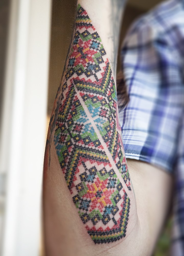 Ukrainian pattern vyshyvka tattoo on the forearm
