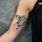 Watercolor calf tattoo