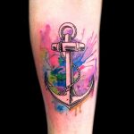 Watercolor splash and anchor tattoo