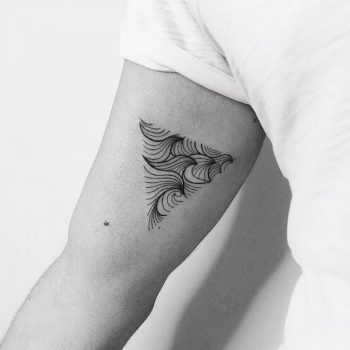 Waves in a triangle tattoo