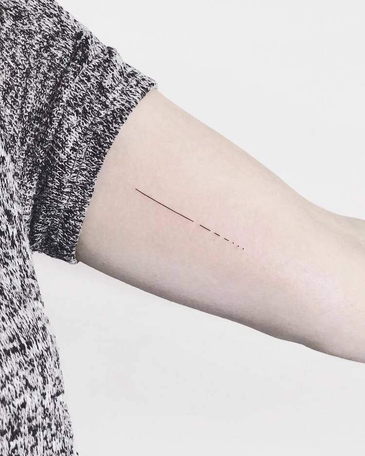 Disappearing line tattoo