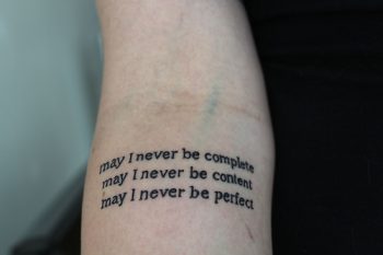 may I never be complete quote tattoo
