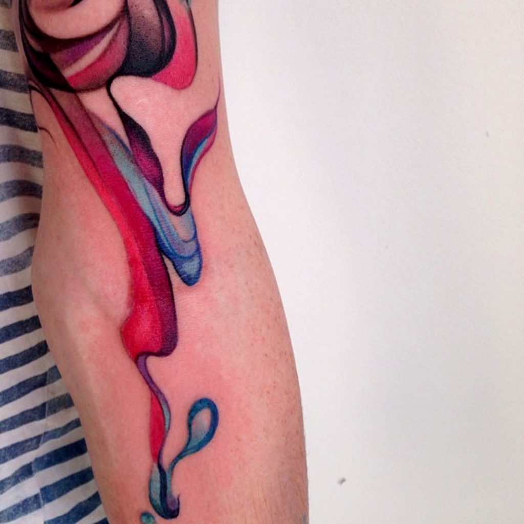 Abstract colorful smoke tattoo
