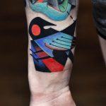 Abstract magpie tattoo