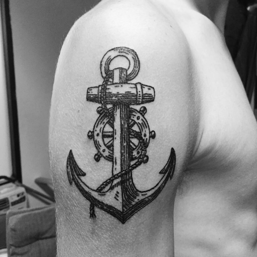Anchor and ship wheel tattoo