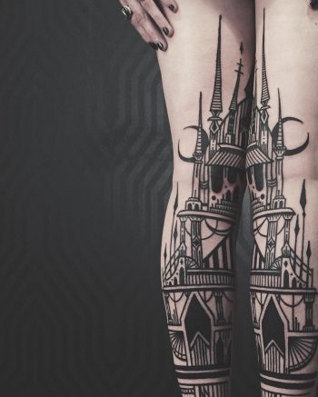 Architectural tattoo on both legs