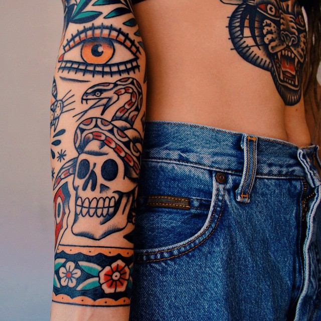 Arm tattooed in traditional style
