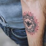 Bee in a mandala tattoo