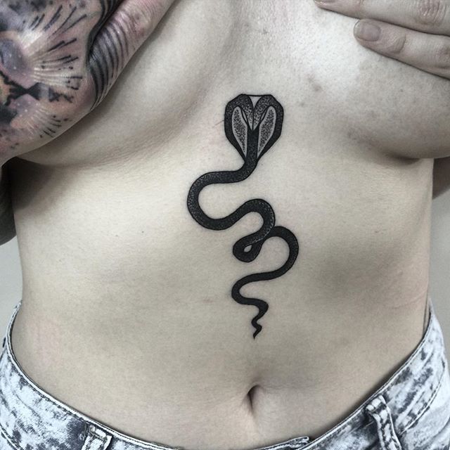 Black cobra tattoo