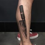 Black knife tattoo