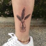 Branches in a jar tattoo