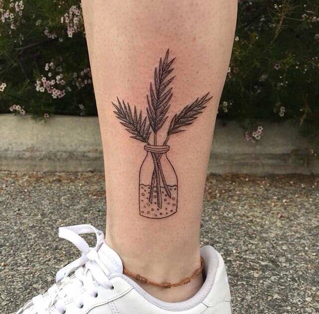 Branches in a jar tattoo