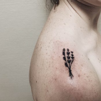 Bundle of flowers shoulder tattoo