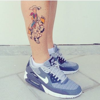 Cartoon cowboy tattoo