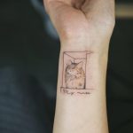 Cat in a box tattoo