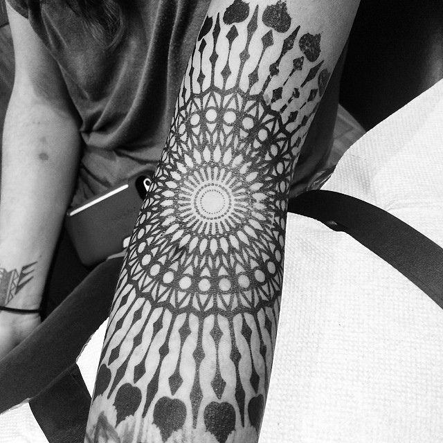 Circular ornamental mandala tattoo