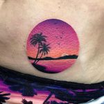 Circular pink landscape tattoo
