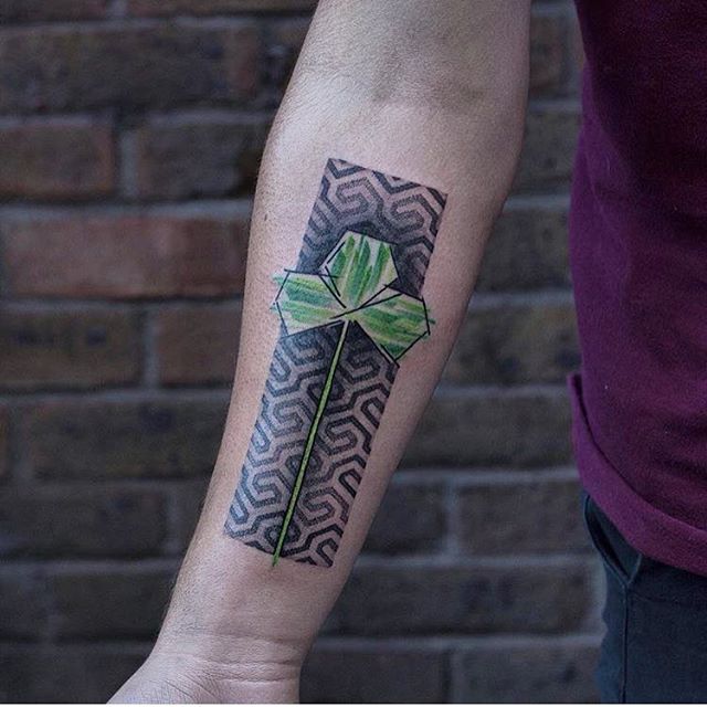 Clover and geometric pattern tattoo