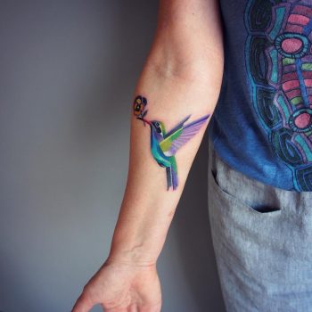 Colorful colibri tattoo