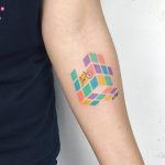 Colorful cube tattoo with a bicycle