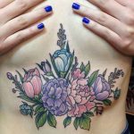 Colorful floral piece on the belly