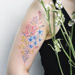 Colorful floral piece on the right arm