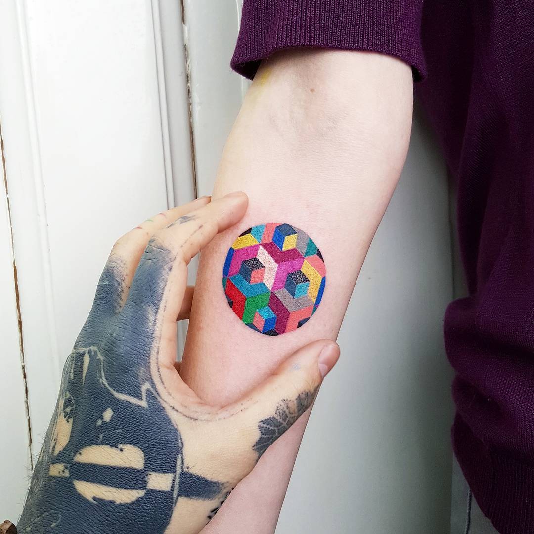 Colorful geometric circle tattoo