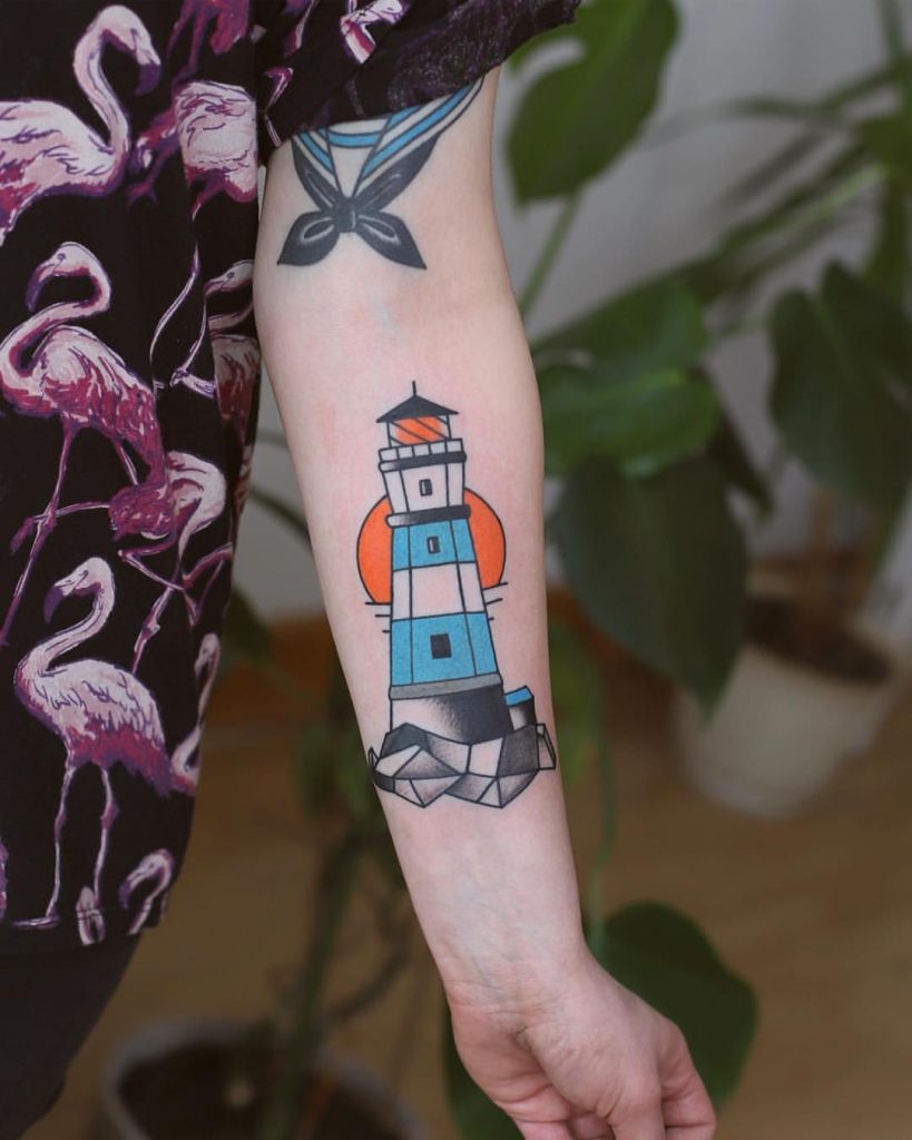 Colorful lighthouse tattoo