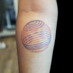 Colorful linear circle tattoo