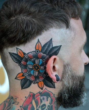 Colorful mandala behind the ear tattoo