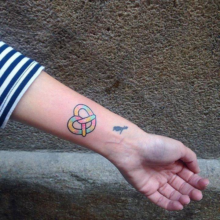 Colorful pretzel tattoo