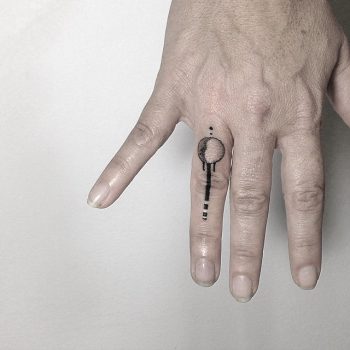 Crescent moon and line tattoo