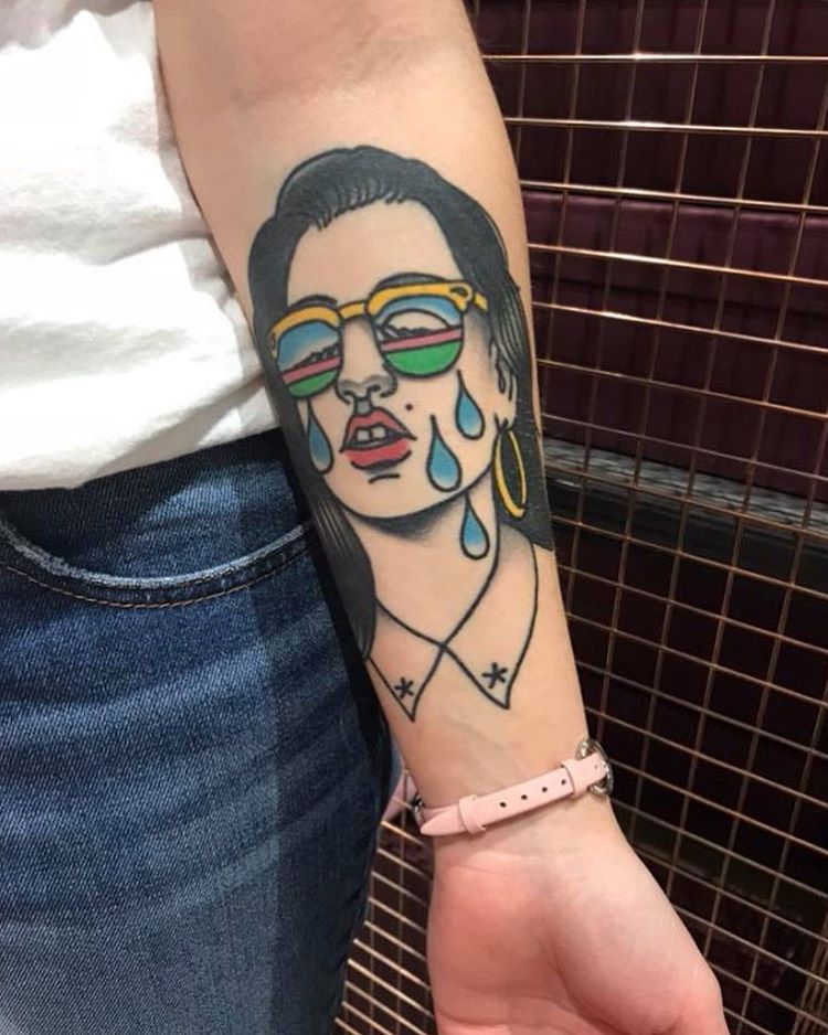 Crying girl tattoo