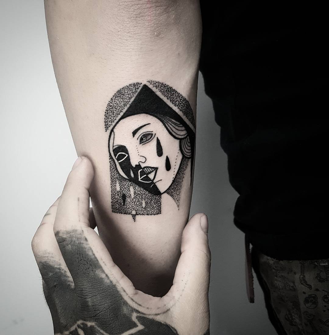 Crying woman tattoo on the arm - Tattoogrid.net