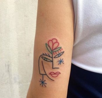 Cubist style face tattoo