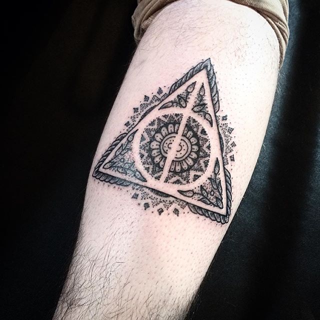 Deathly hallows stylized tattoo 
