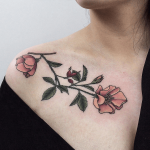 Delicate flowers collarbone tattoo
