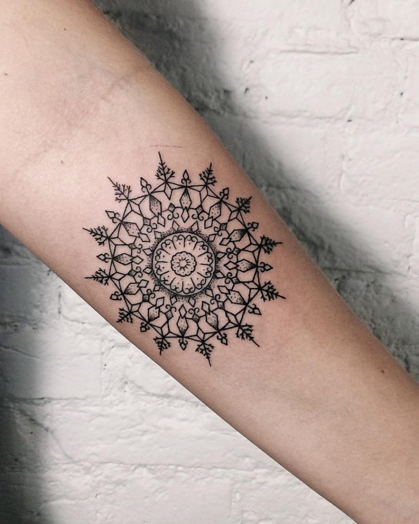 Delicate geometric circled pattern tattoo