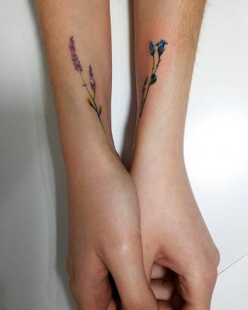 Delicate violet and blue flower tattoos